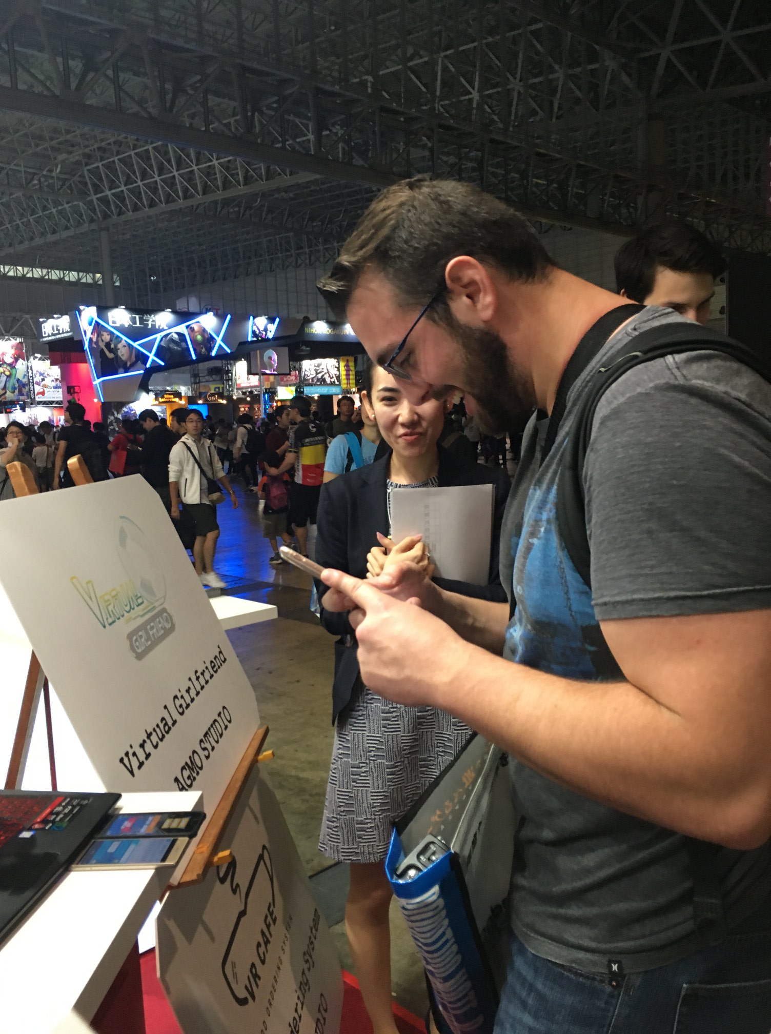 A Man Scanning Virtual Girlfriend QR Code